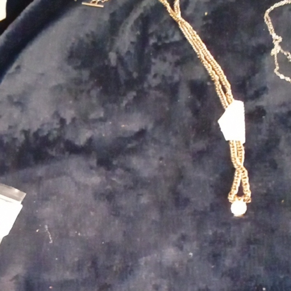 Gold and White Jewelry Accessory